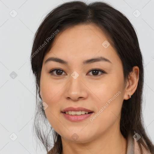 Joyful white young-adult female with medium  brown hair and brown eyes