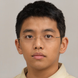 Neutral asian young-adult male with short  brown hair and brown eyes