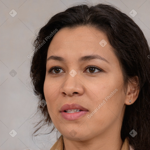 Joyful white adult female with medium  brown hair and brown eyes