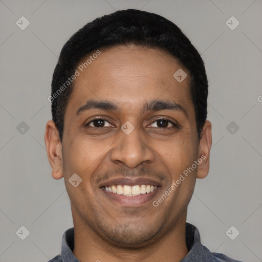 Joyful latino young-adult male with short  black hair and brown eyes