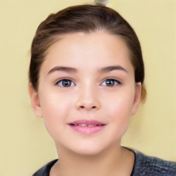 Joyful white child female with short  brown hair and brown eyes