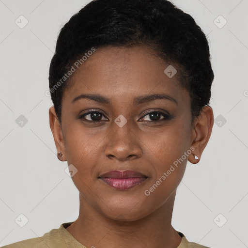 Joyful black young-adult female with short  black hair and brown eyes