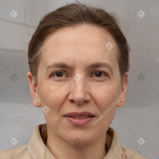 Joyful white adult female with short  brown hair and brown eyes