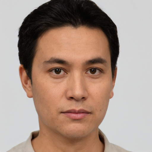 Neutral asian young-adult male with short  brown hair and brown eyes