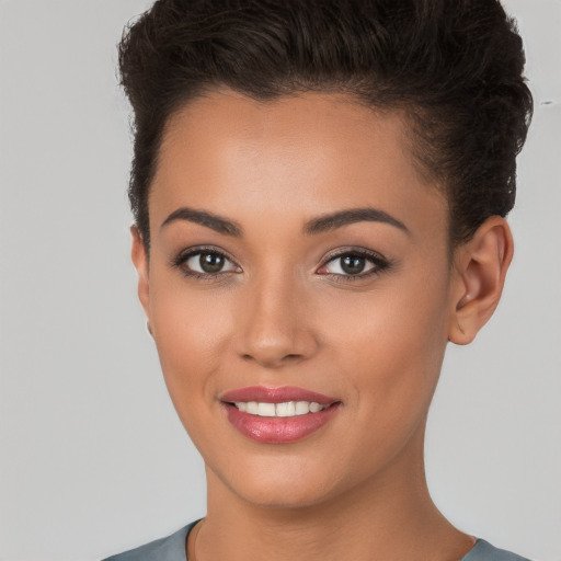 Joyful white young-adult female with short  brown hair and brown eyes