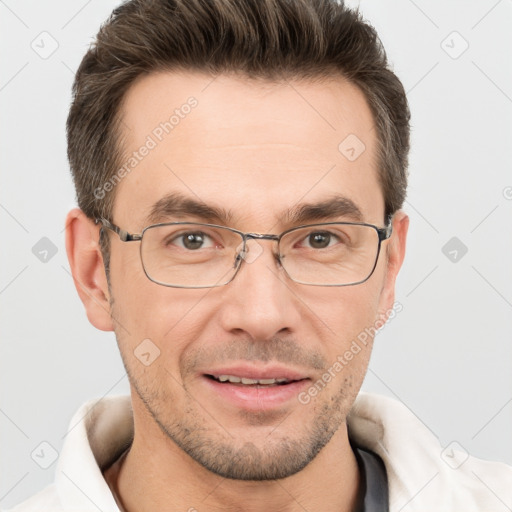 Joyful white adult male with short  brown hair and brown eyes