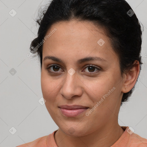 Joyful latino young-adult female with short  brown hair and brown eyes