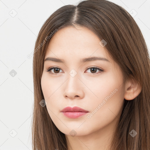 Neutral white young-adult female with long  brown hair and brown eyes