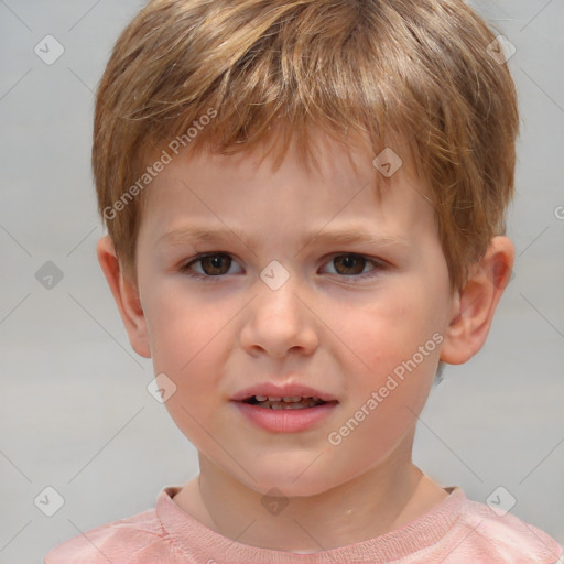 Joyful white child male with short  brown hair and brown eyes