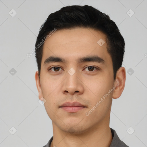 Neutral asian young-adult male with short  black hair and brown eyes