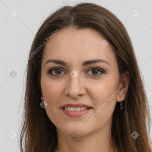 Joyful white young-adult female with long  brown hair and grey eyes