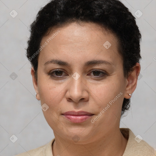 Joyful white adult female with short  brown hair and brown eyes