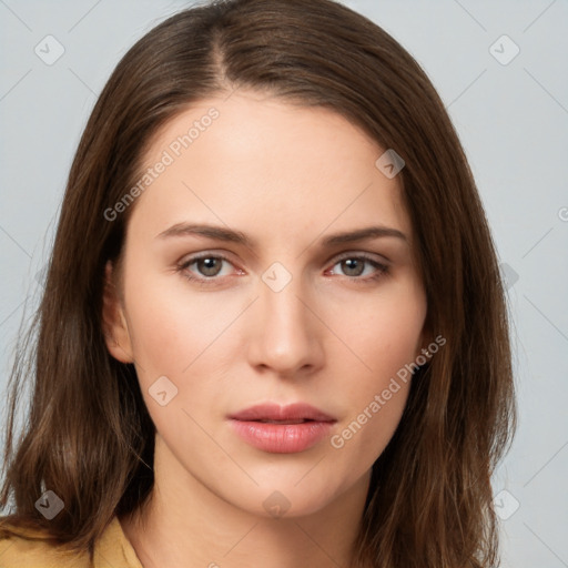 Neutral white young-adult female with long  brown hair and brown eyes