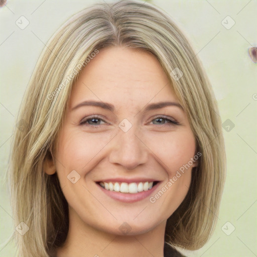 Joyful white young-adult female with long  brown hair and green eyes