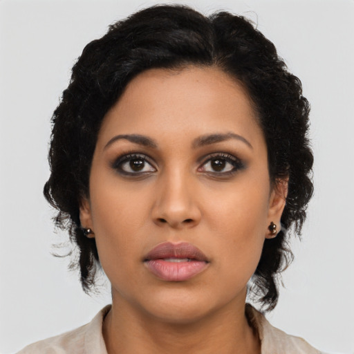 Neutral latino young-adult female with long  black hair and brown eyes