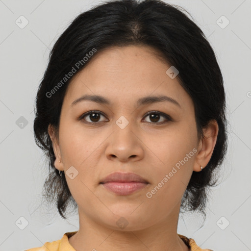 Joyful latino young-adult female with medium  brown hair and brown eyes