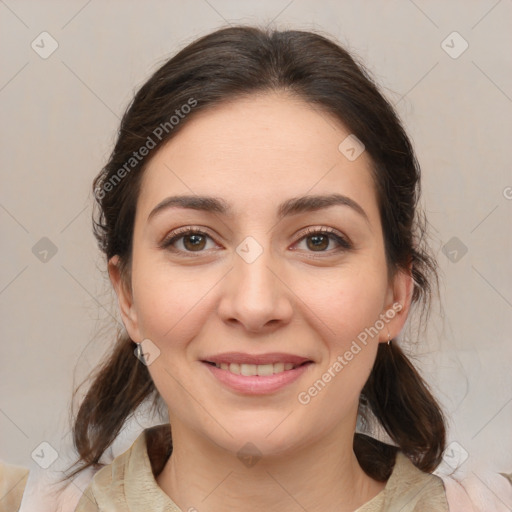 Joyful white young-adult female with medium  brown hair and brown eyes