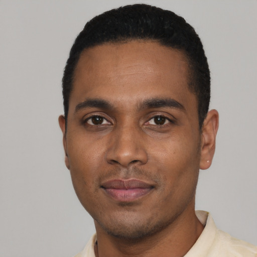 Neutral black young-adult male with short  black hair and brown eyes