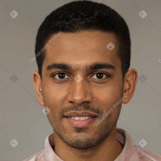 Joyful black young-adult male with short  black hair and brown eyes