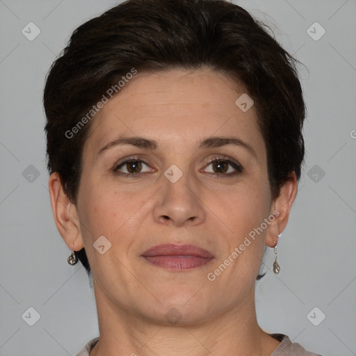 Joyful white adult female with short  brown hair and brown eyes