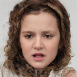 Joyful white child female with long  brown hair and brown eyes