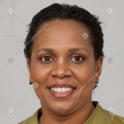 Joyful latino adult female with short  brown hair and brown eyes