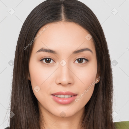 Joyful asian young-adult female with long  brown hair and brown eyes