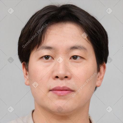 Neutral asian young-adult male with short  brown hair and brown eyes