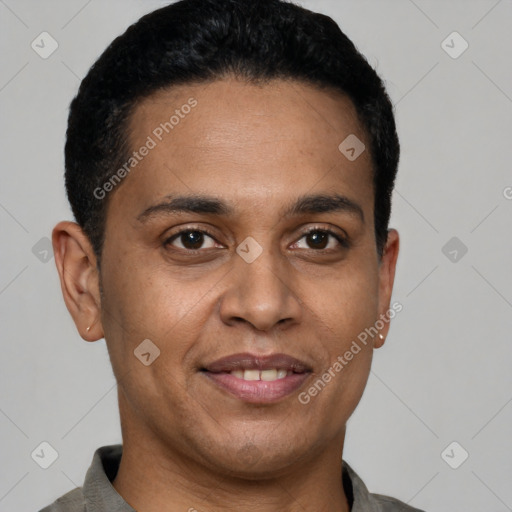 Joyful latino young-adult male with short  black hair and brown eyes