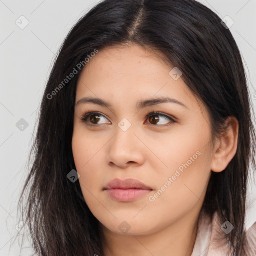 Joyful asian young-adult female with long  brown hair and brown eyes