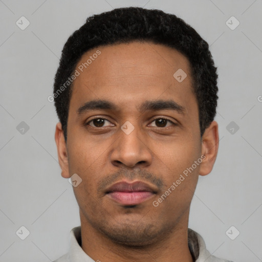 Neutral latino young-adult male with short  black hair and brown eyes