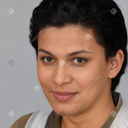 Joyful latino young-adult female with short  brown hair and brown eyes