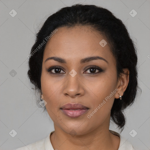 Joyful latino young-adult female with medium  black hair and brown eyes