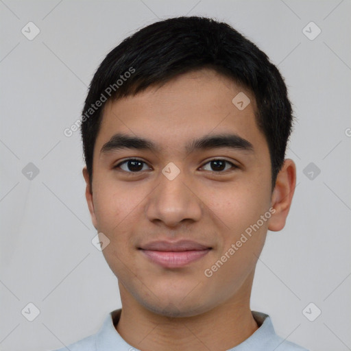 Joyful white young-adult male with short  black hair and brown eyes