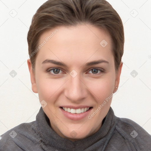 Joyful white young-adult female with short  brown hair and brown eyes