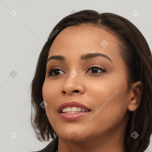 Joyful white young-adult female with long  brown hair and brown eyes