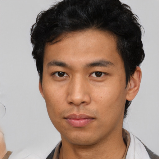 Neutral asian young-adult male with short  black hair and brown eyes