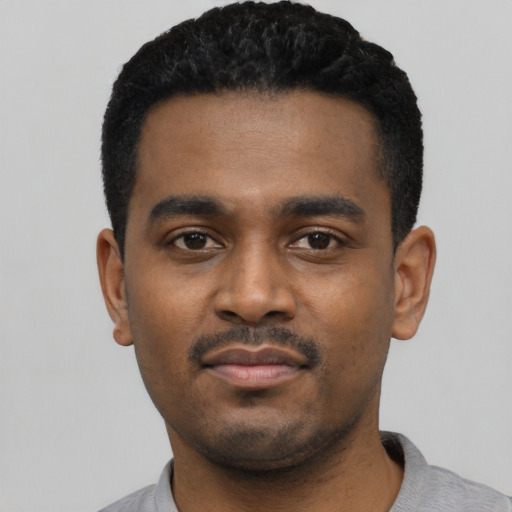 Neutral black young-adult male with short  black hair and brown eyes