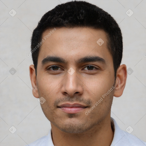 Neutral latino young-adult male with short  black hair and brown eyes