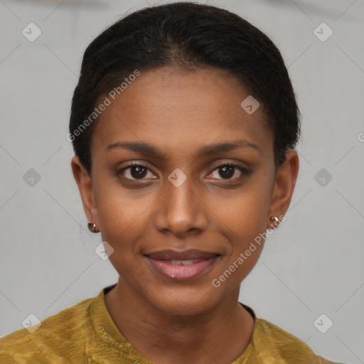 Joyful black young-adult female with short  brown hair and brown eyes