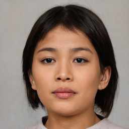 Neutral asian young-adult female with medium  brown hair and brown eyes