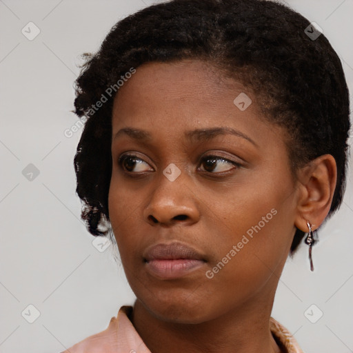 Neutral black young-adult female with short  brown hair and brown eyes