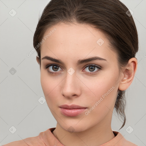 Neutral white young-adult female with medium  brown hair and brown eyes