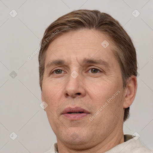 Neutral white adult male with short  brown hair and brown eyes