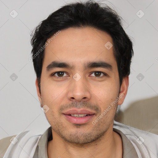 Joyful asian young-adult male with short  black hair and brown eyes