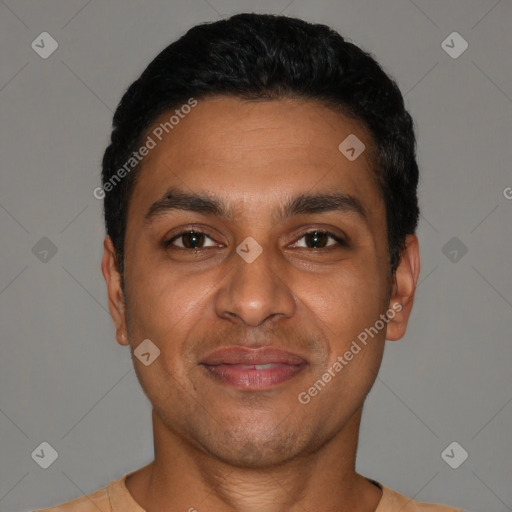 Joyful latino young-adult male with short  black hair and brown eyes