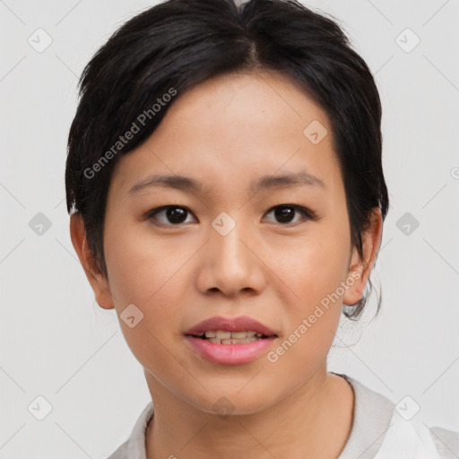 Joyful asian young-adult female with medium  black hair and brown eyes