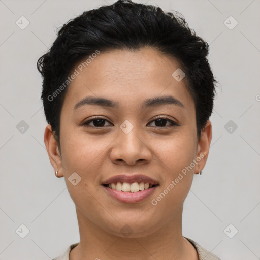 Joyful latino young-adult female with short  black hair and brown eyes