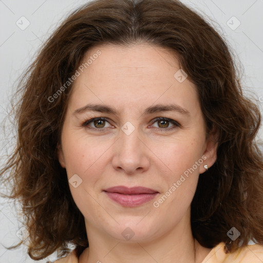 Joyful white young-adult female with medium  brown hair and green eyes