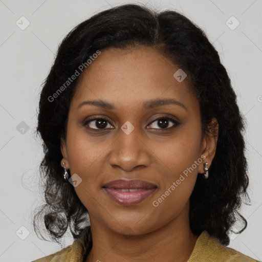 Joyful black young-adult female with medium  brown hair and brown eyes